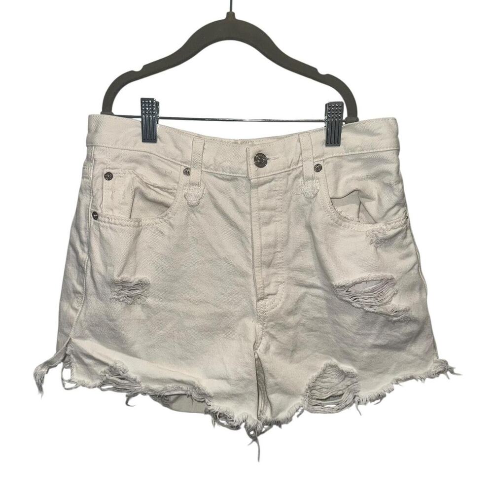 White distressed free people denim